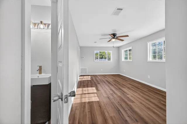 a view of front door with wooden floor