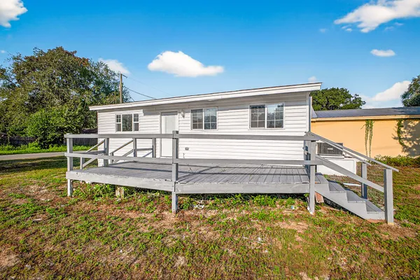 a view of a house with a swimming pool