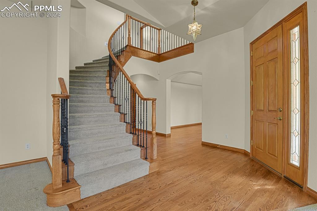 810 Dolan Drive Monument, CO 80132 - Photo 31 of 50 a view of entryway and hall with wooden floor