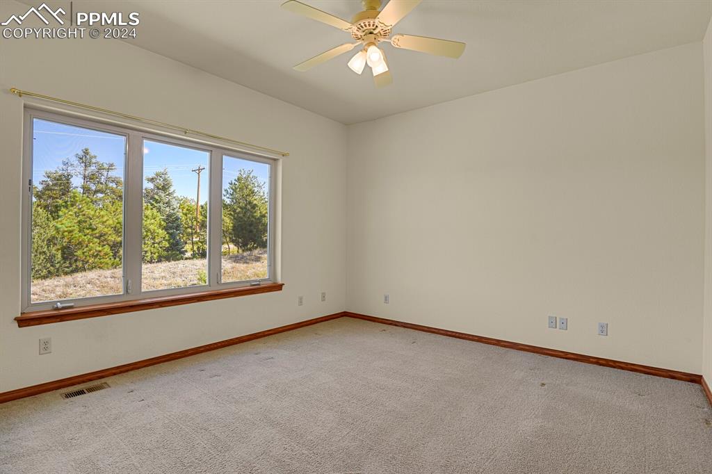 810 Dolan Drive Monument, CO 80132 - Photo 45 of 50 an empty room with a window
