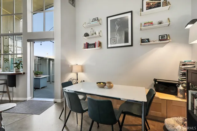 a view of a workspace with furniture