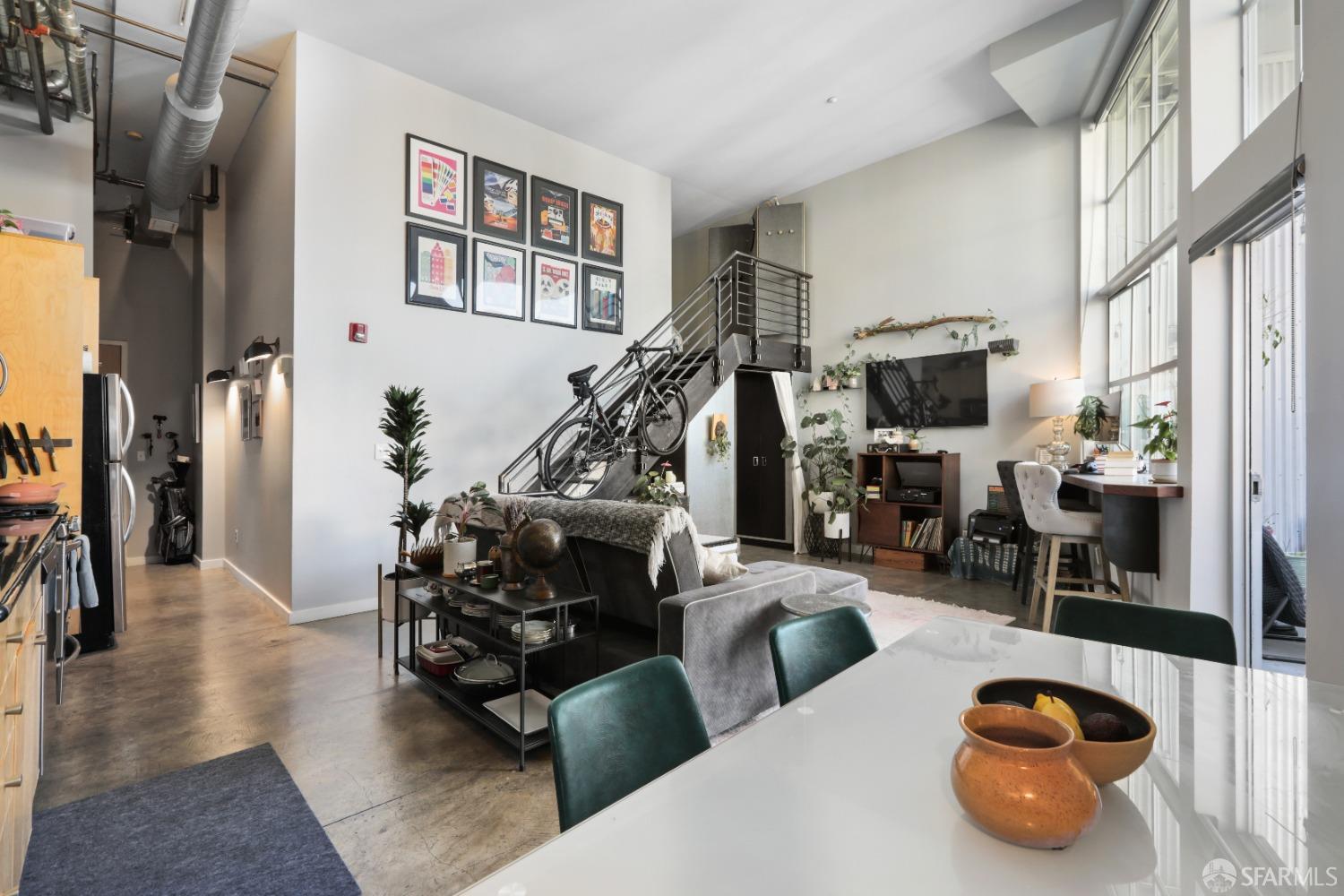 60 Rausch Street, Unit 303 San Francisco, CA 94103 - Photo 15 of 39 a living room with furniture and a flat screen tv