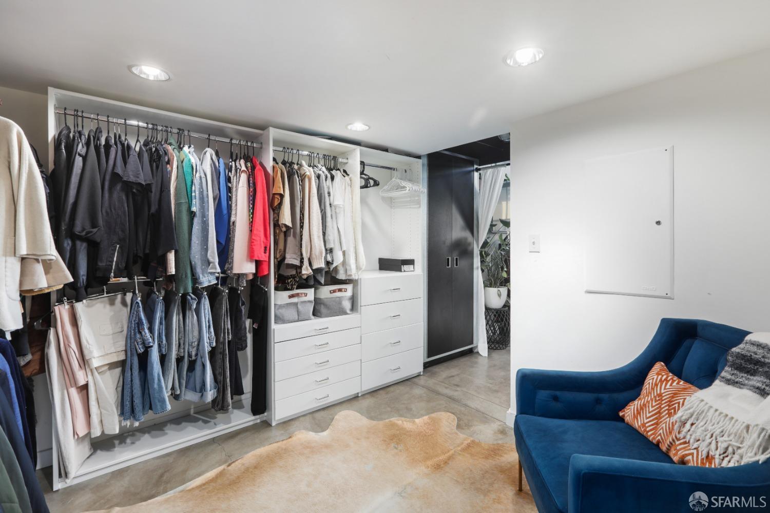60 Rausch Street, Unit 303 San Francisco, CA 94103 - Photo 23 of 39 a living room with furniture and a walk in closet