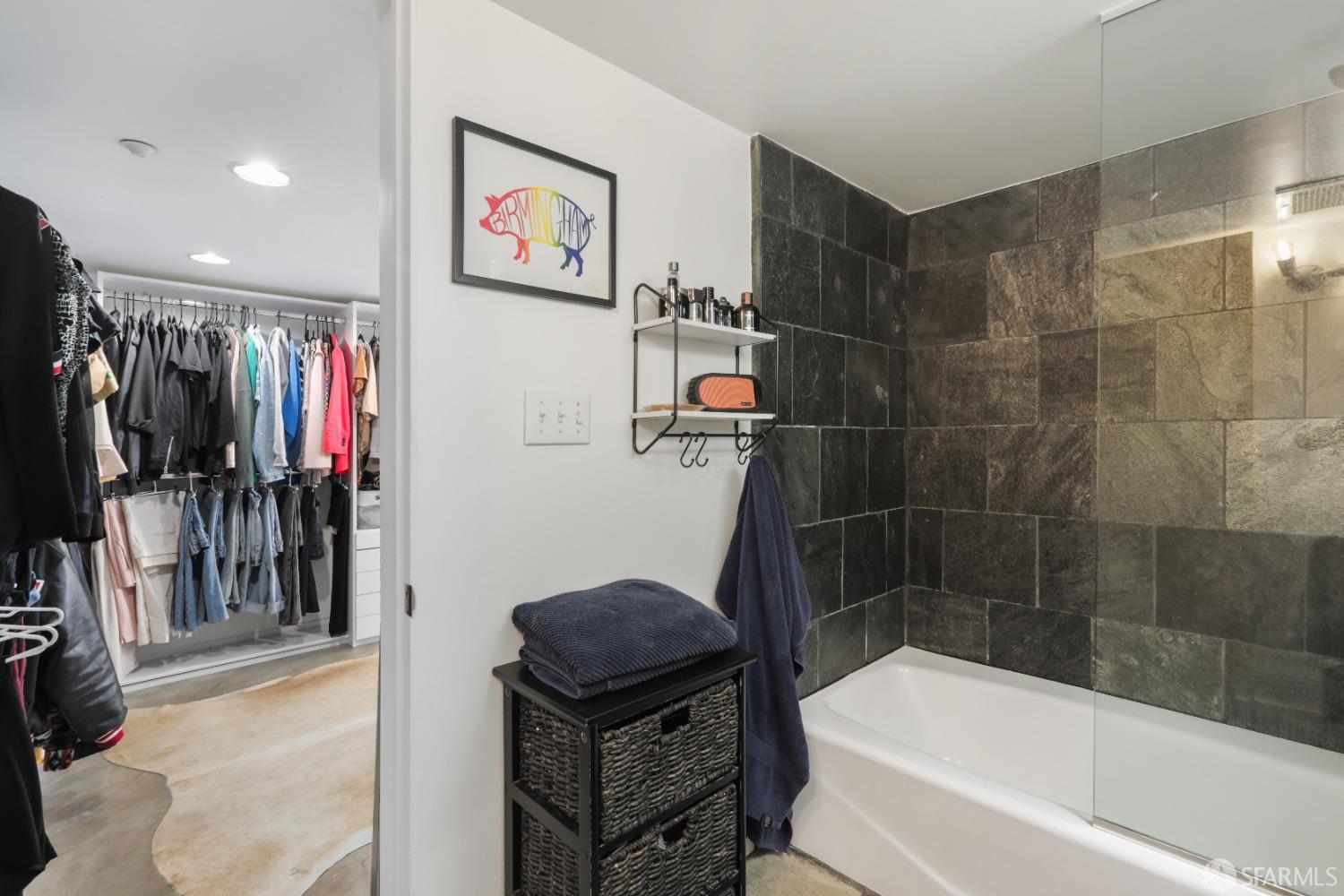 60 Rausch Street, Unit 303 San Francisco, CA 94103 - Photo 25 of 39 a bathroom with a bathtub and a shower