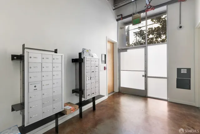 a view of a livingroom with furniture and a flat screen tv