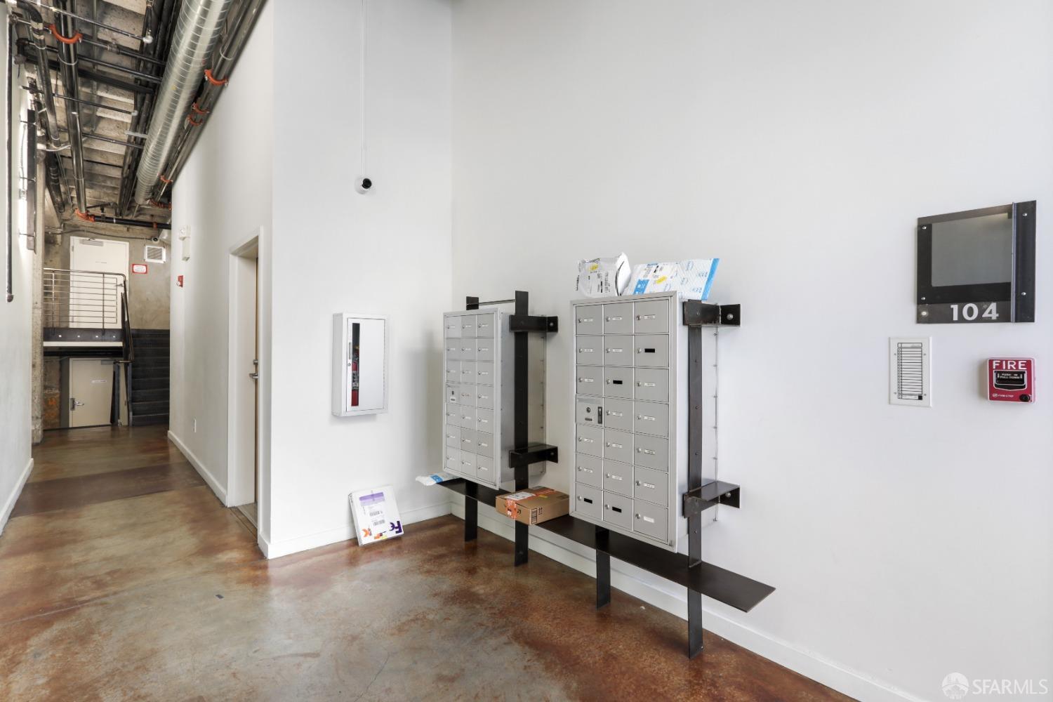 60 Rausch Street, Unit 303 San Francisco, CA 94103 - Photo 34 of 39 a view of a livingroom with furniture and a flat screen tv