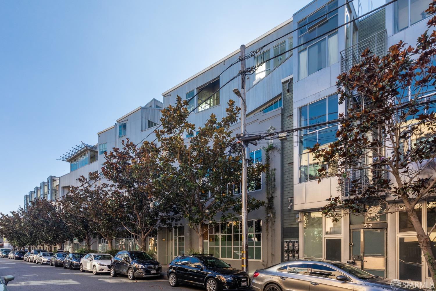 60 Rausch Street, Unit 303 San Francisco, CA 94103 - Photo 36 of 39 a city street lined with buildings and cars