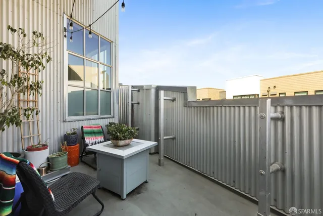 a kitchen with stainless steel appliances a sink stove and cabinets