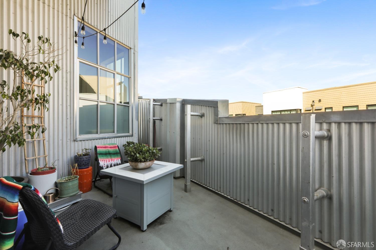 60 Rausch Street, Unit 303 San Francisco, CA 94103 - Photo 9 of 39 a balcony with furniture and a potted plant