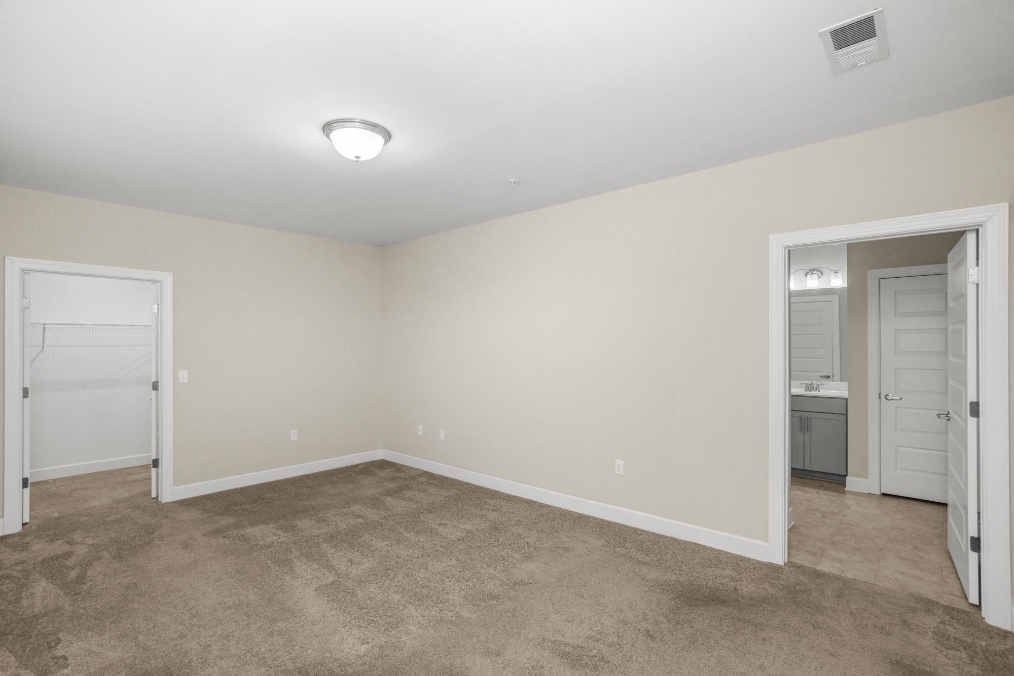 141 Saundersville Road, Unit 1402 Hendersonville, TN 37075 - Photo 18 of 60 an empty room with a empty space and windows