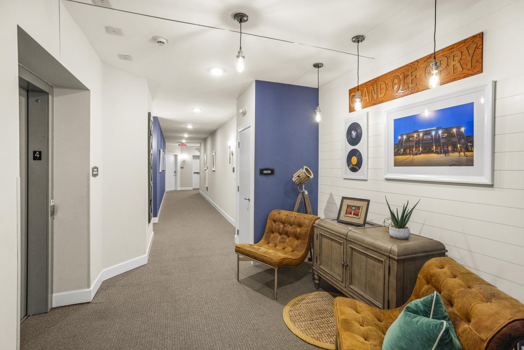 141 Saundersville Road, Unit 1402 Hendersonville, TN 37075 - Photo 38 of 60 a living room with furniture and a chandelier