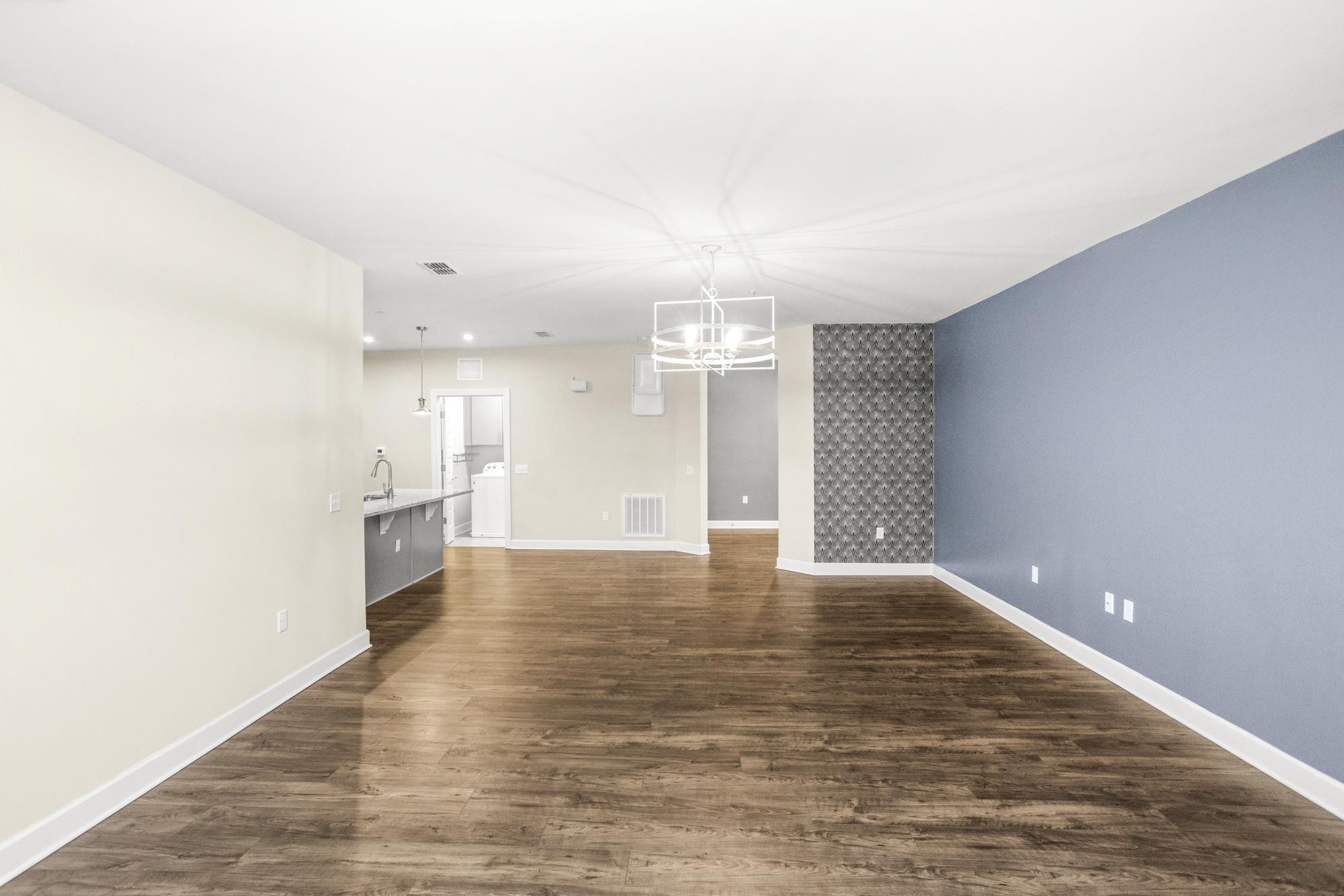 141 Saundersville Road, Unit 1402 Hendersonville, TN 37075 - Photo 10 of 60 a view of empty room with wooden floor