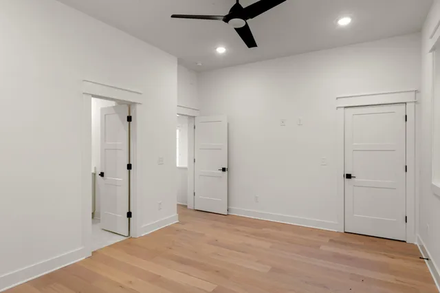 a bathroom with a bathtub and a toilet