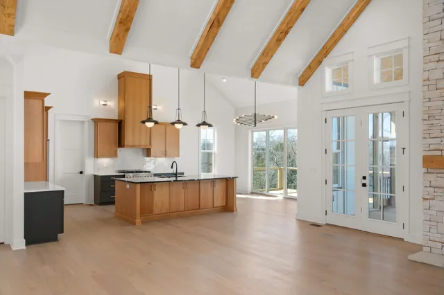a view of kitchen with stainless steel appliances kitchen island