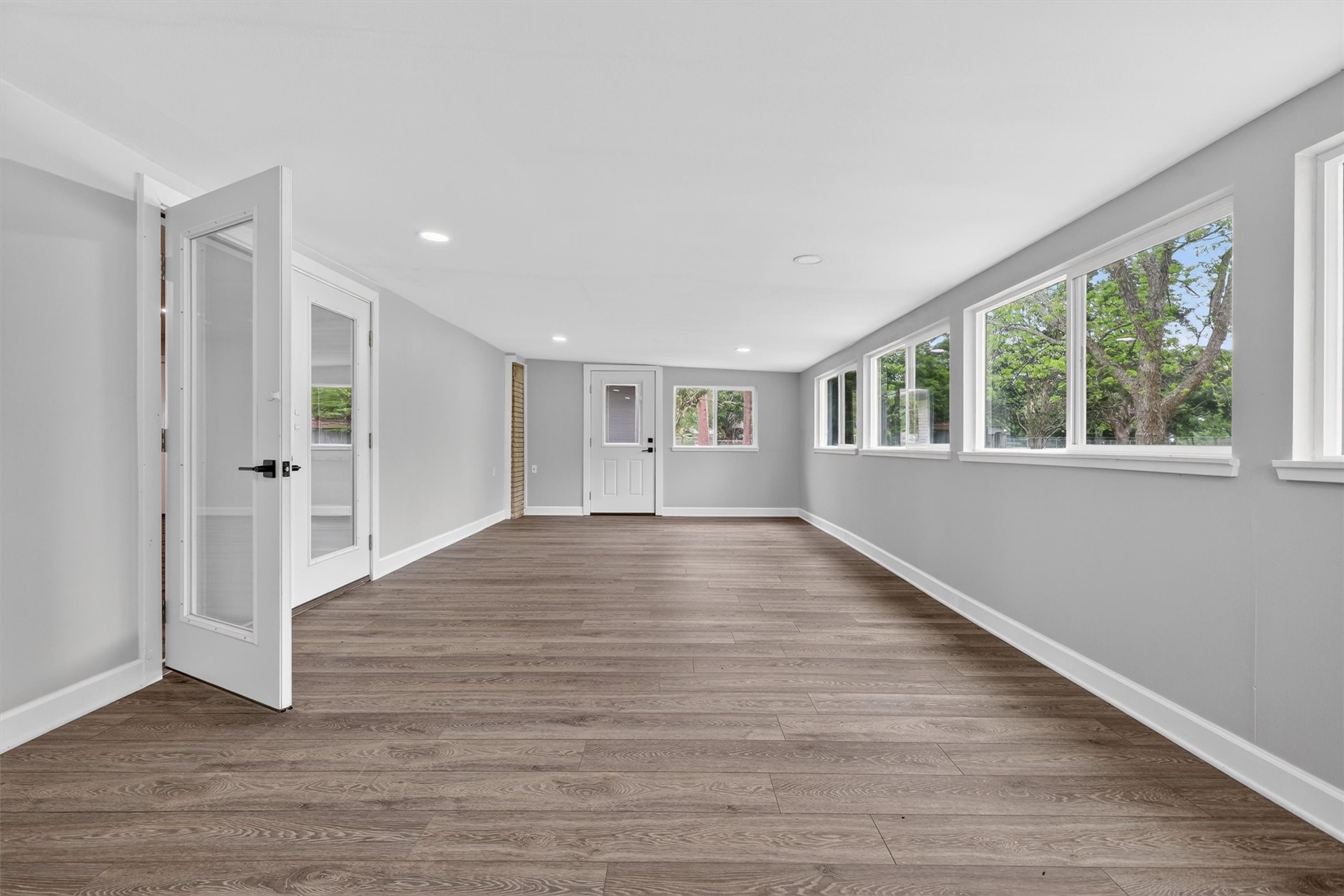 379 Hale Road Bay City, TX 77414 - Photo 14 of 28 a view of empty room with wooden floor and fan