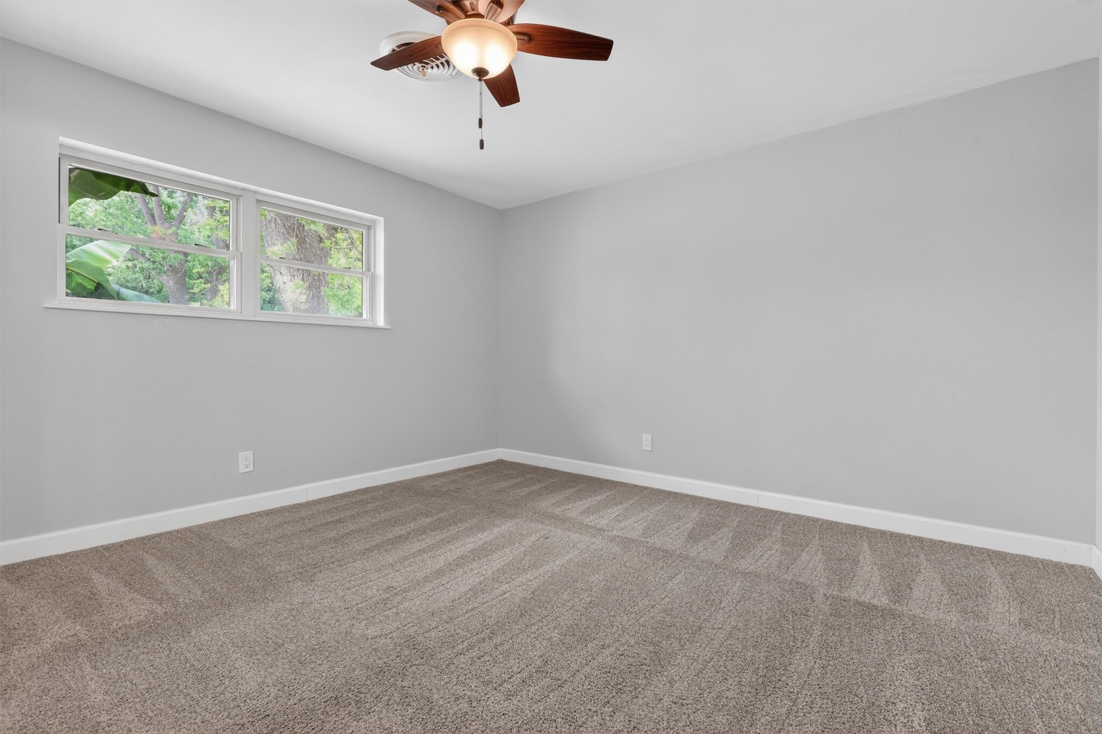 379 Hale Road Bay City, TX 77414 - Photo 16 of 28 an empty room with a window
