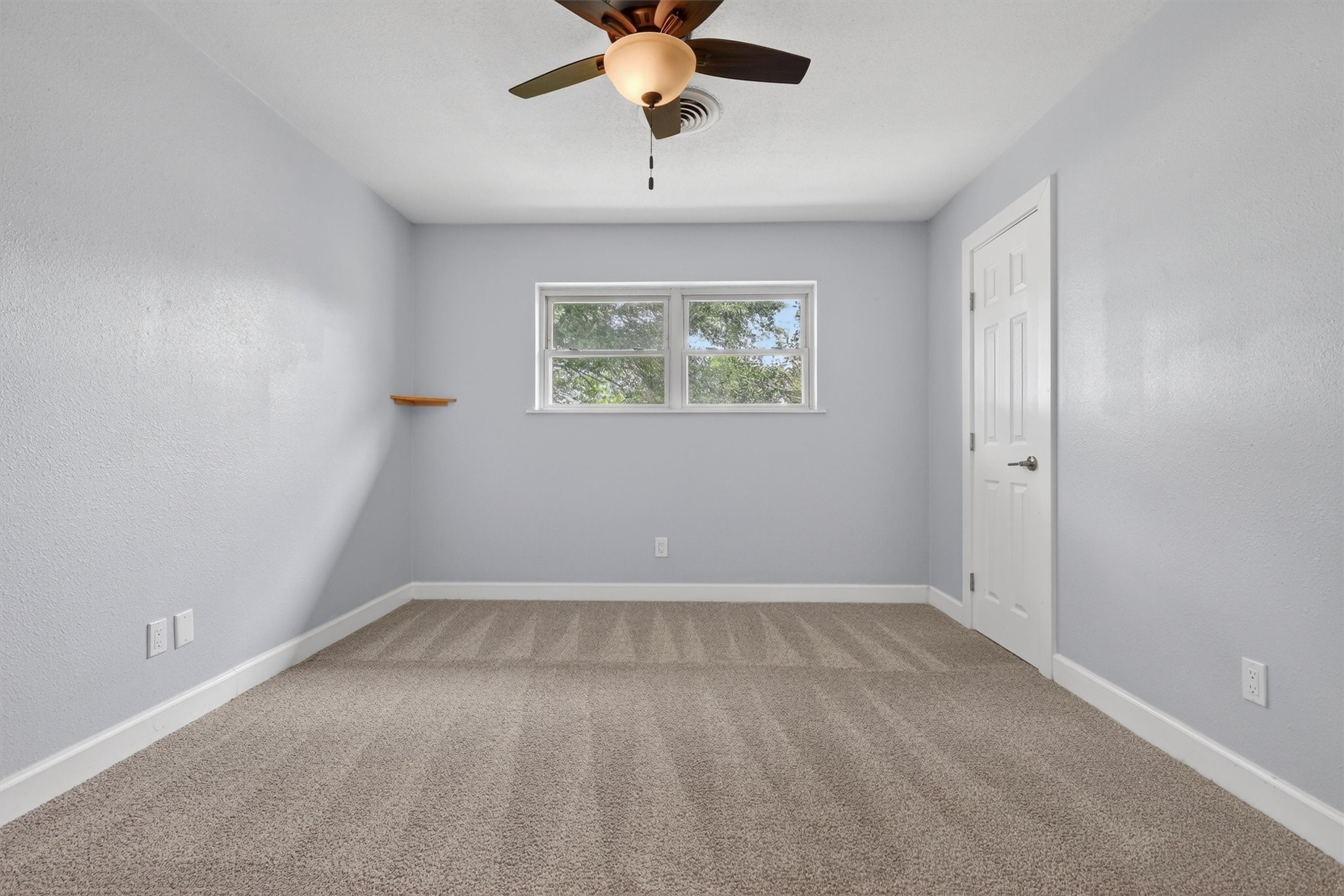 379 Hale Road Bay City, TX 77414 - Photo 20 of 28 a view of an empty room with a window