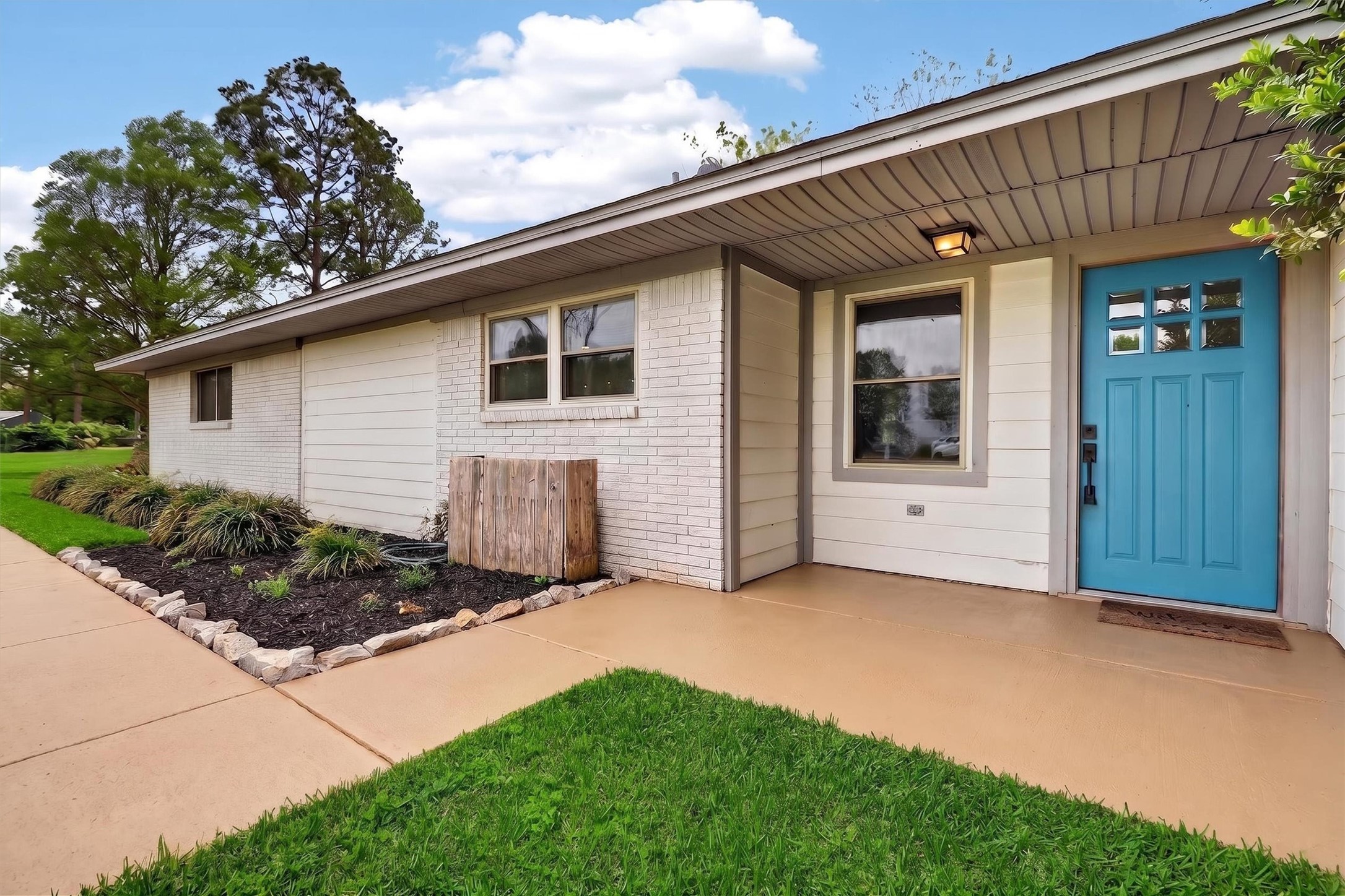 379 Hale Road Bay City, TX 77414 - Photo 2 of 28 a view of a house with backyard and porch