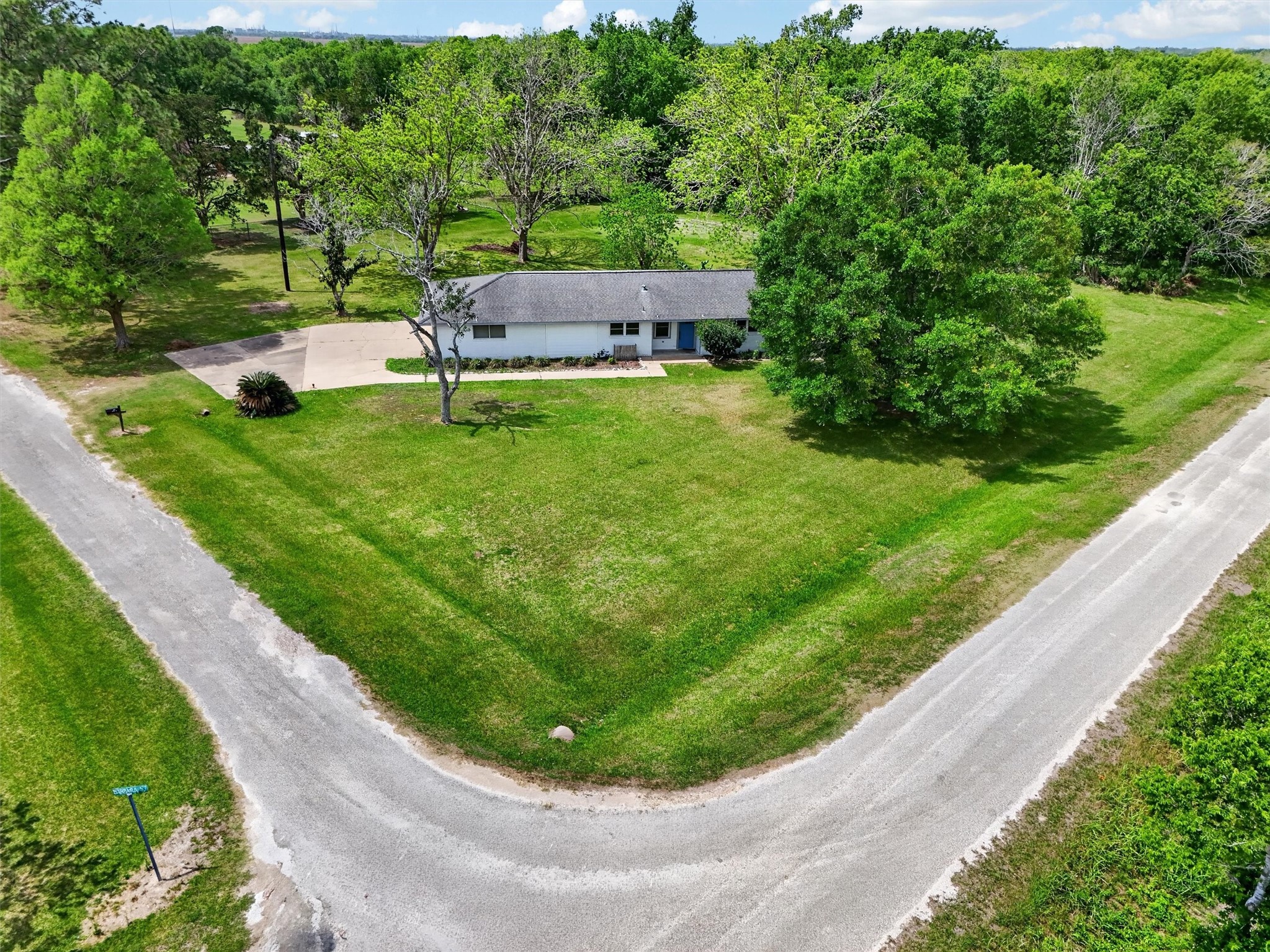 379 Hale Road Bay City, TX 77414 - Photo 26 of 28 a view of a backyard with a garden