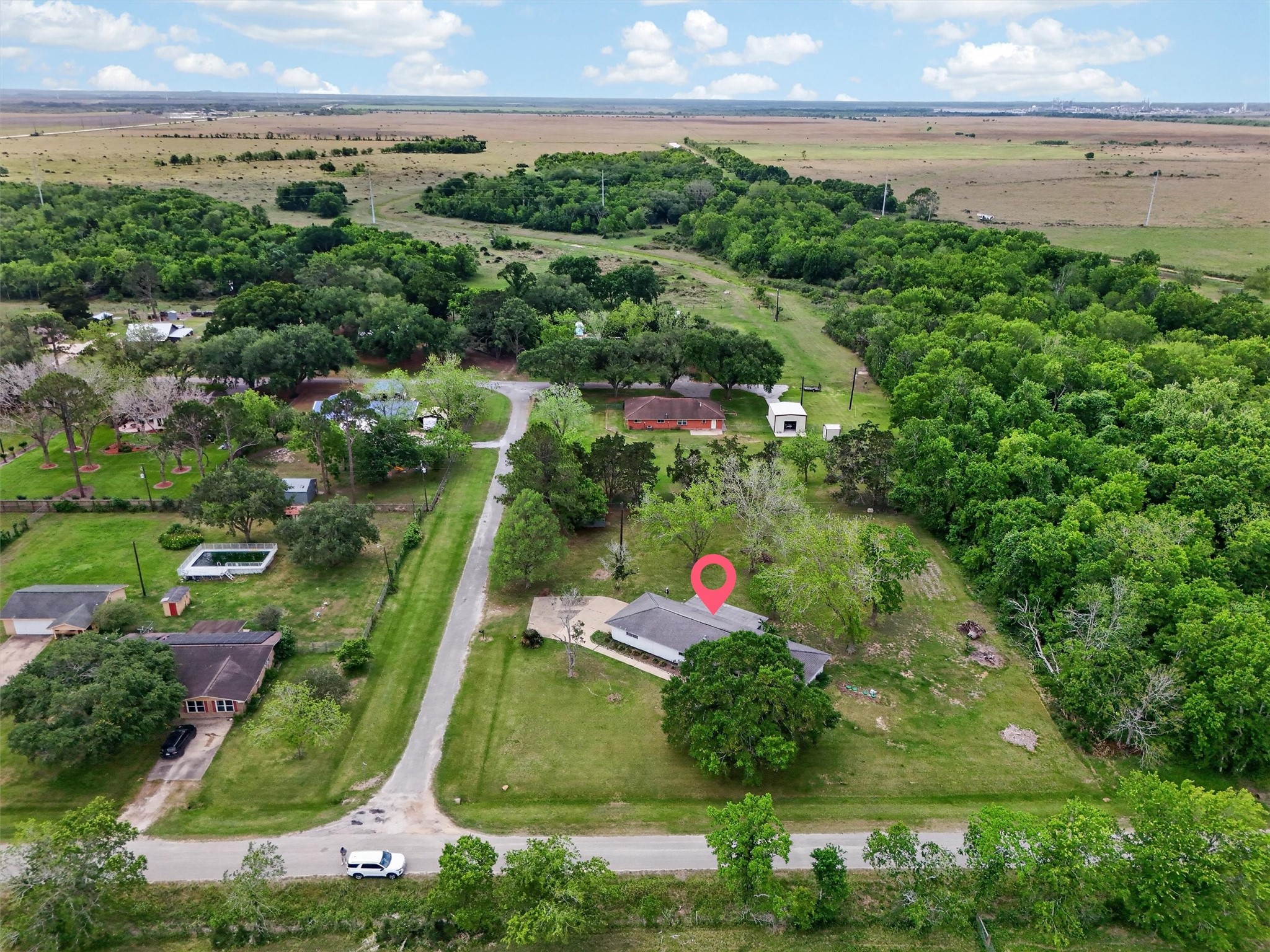 379 Hale Road Bay City, TX 77414 - Photo 28 of 28 an aerial view of residential houses with outdoor space and trees