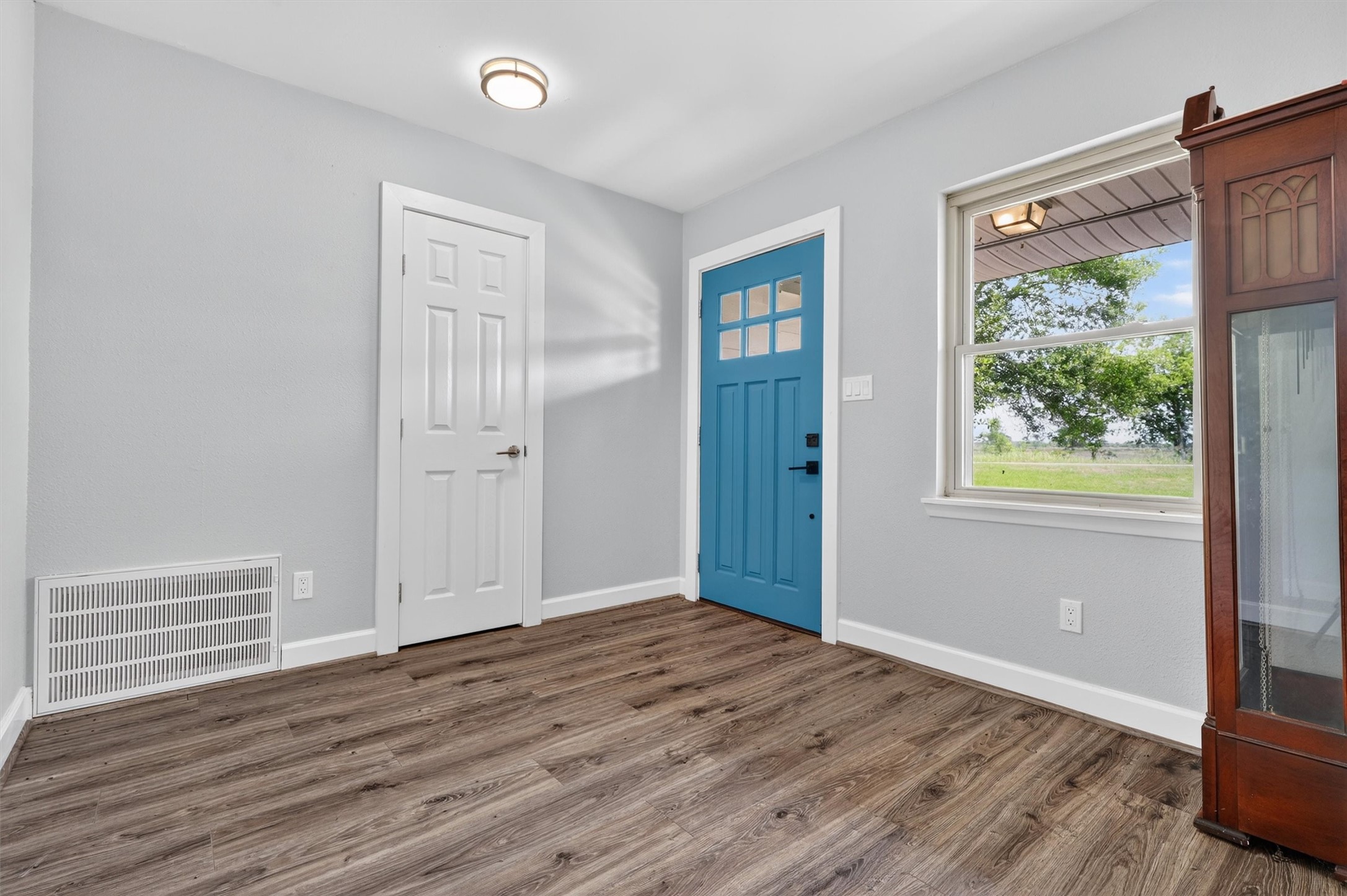 379 Hale Road Bay City, TX 77414 - Photo 5 of 28 a view of empty room with wooden floor and fan