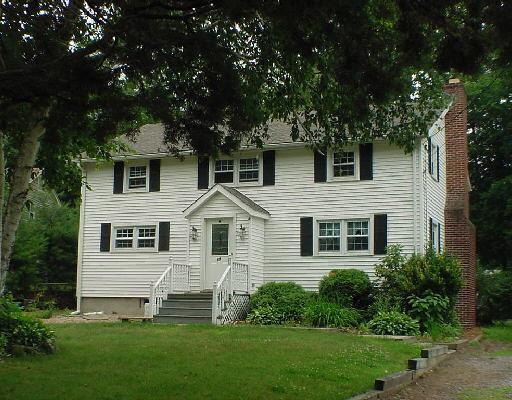 89 West Lake Road Trumbull, CT 06611 - Photo 1 of 1 a front view of a house with a yard and green space
