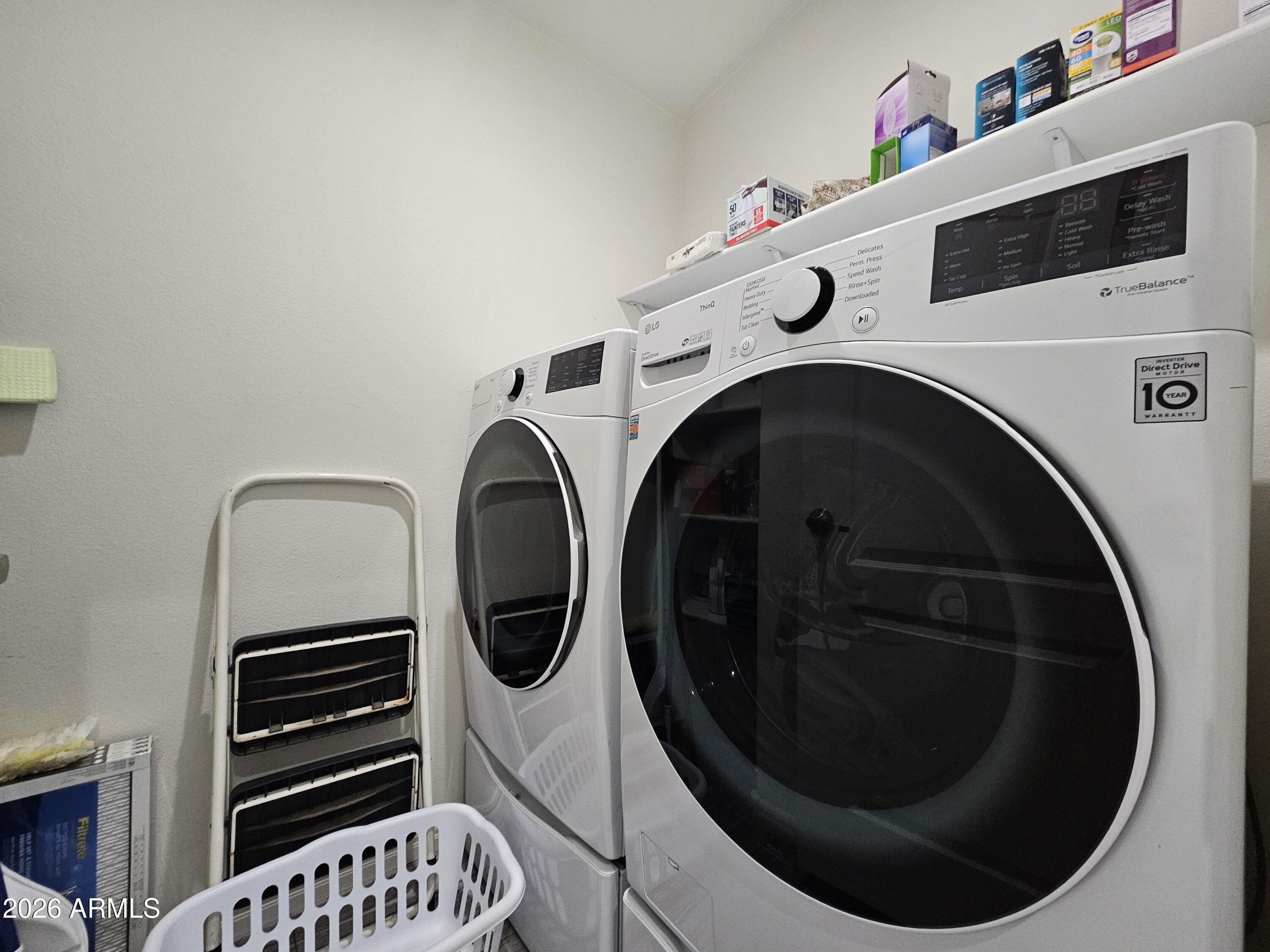 650 North Hawes Road, Unit 3223 Mesa, AZ 85207 - Photo 19 of 39 a utility room with dryer and washer