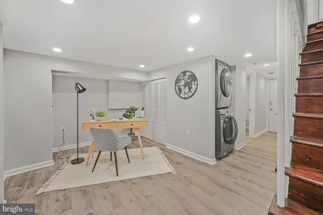 a dining room with a table and chairs