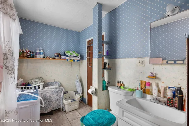 a view of a hallway view with staircase