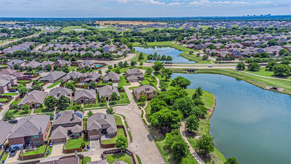 1805 Stetson Way Allen, TX 75002 - Photo 21 of 22 Aerial perspective showcasing a residential community with numerous homes and extensive green spaces