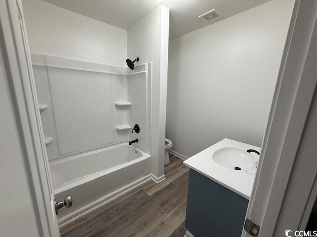 2851 Highway 984 Galivants Ferry, SC 29544 - Photo 13 of 23 Bathroom featuring vanity, shower / tub combination, and dark wood-type flooring