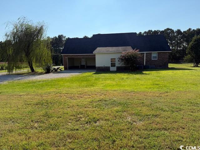2851 Highway 984 Galivants Ferry, SC 29544 - Photo 5 of 23 Single story home featuring driveway, a front yard, and a carport