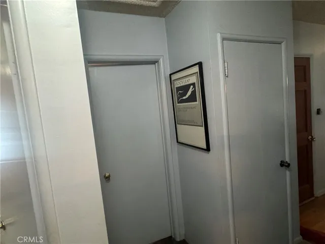 a bathroom with a shower and a sink