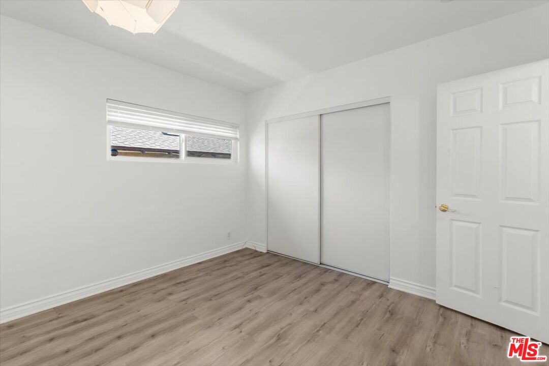 262 MacDonald Street Pasadena, CA 91103 - Photo 19 of 26 a view of empty room with wooden floor