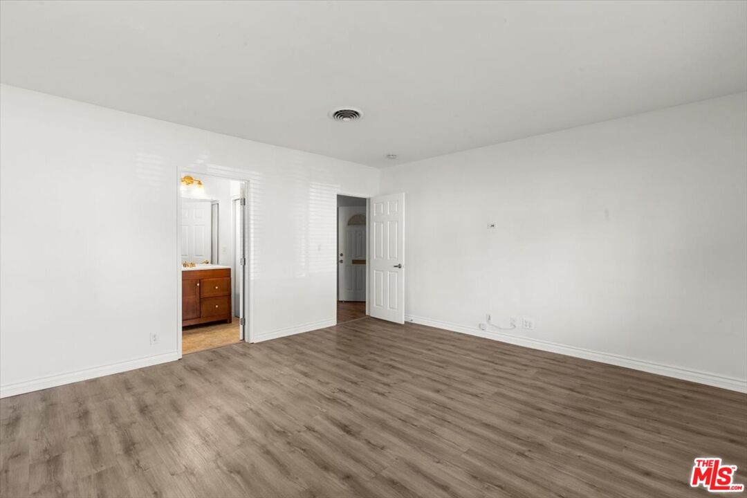 262 MacDonald Street Pasadena, CA 91103 - Photo 23 of 26 a view of an empty room with wooden floor