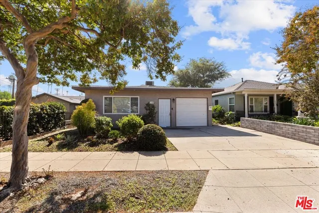 front view of a house with a patio