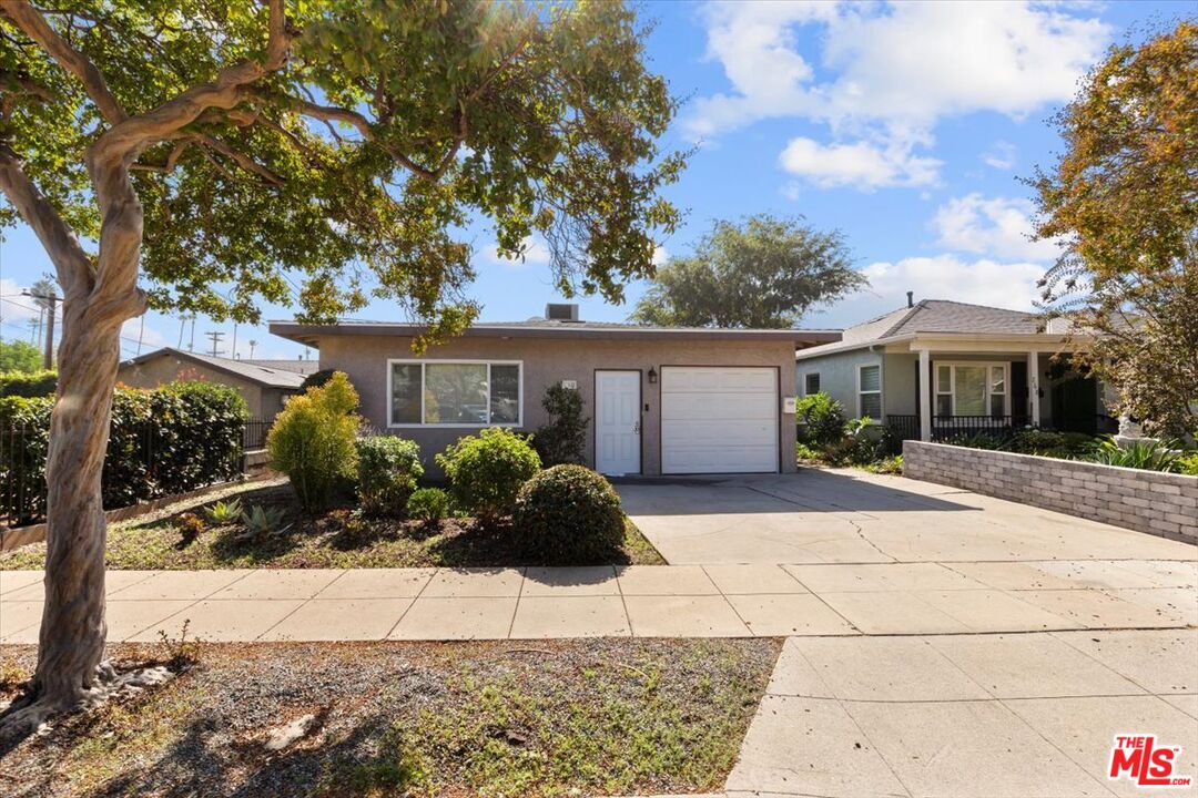 262 MacDonald Street Pasadena, CA 91103 - Photo 3 of 26 front view of a house with a patio