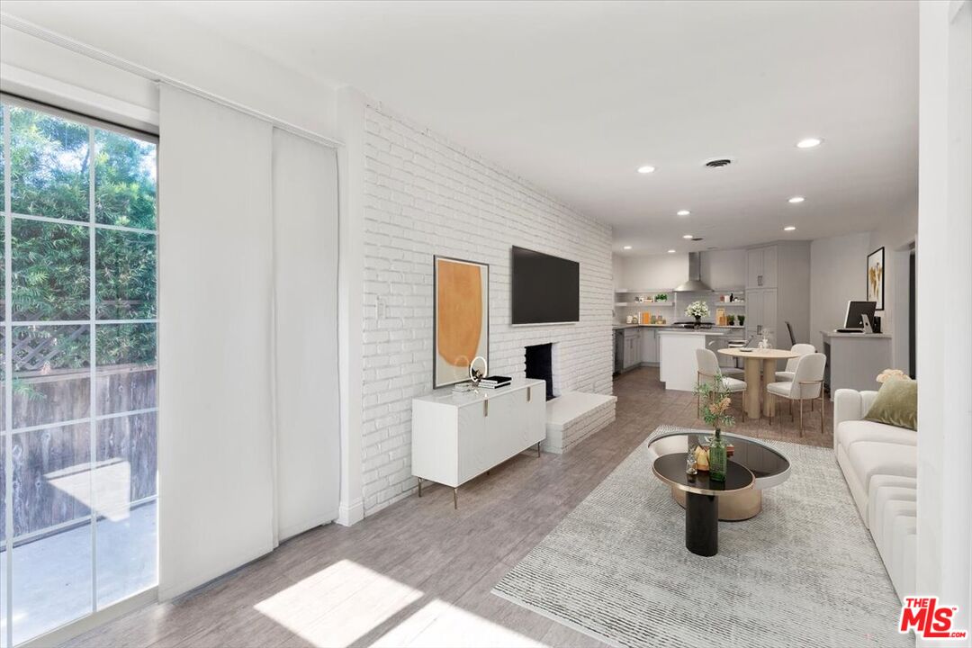 262 MacDonald Street Pasadena, CA 91103 - Photo 7 of 26 a living room with furniture and a flat screen tv