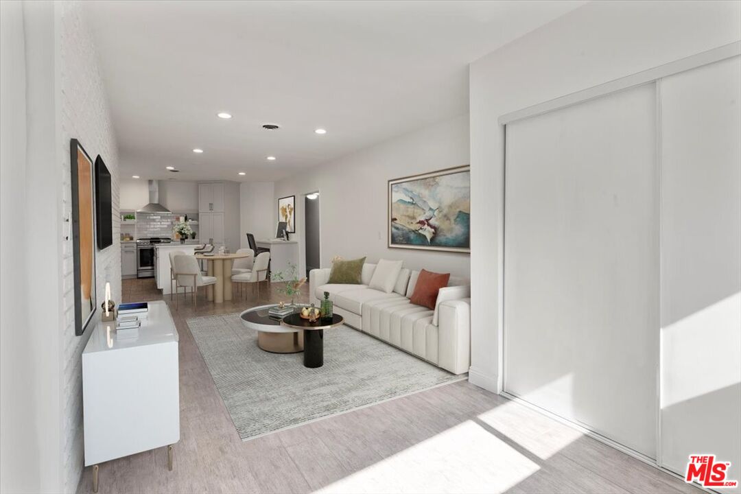 262 MacDonald Street Pasadena, CA 91103 - Photo 9 of 26 a living room with furniture and a couch