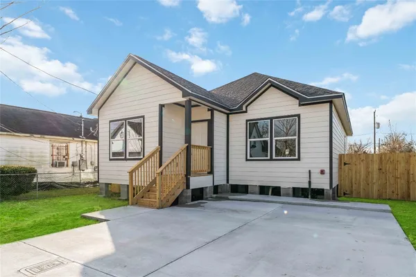 a house view with a garden space