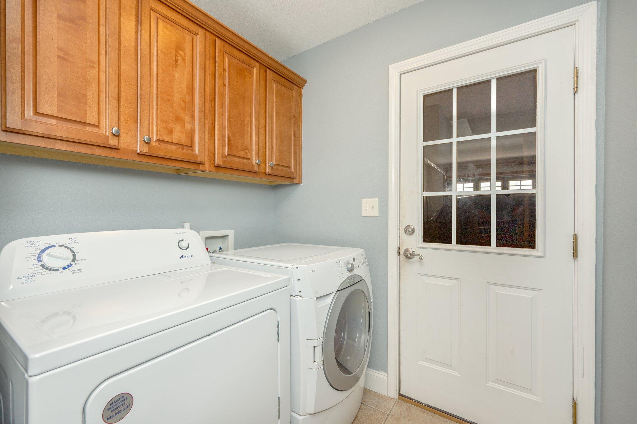 730 Riva Ridge Drive Crestview, FL 32539 - Photo 27 of 29 a utility room with dryer and washer
