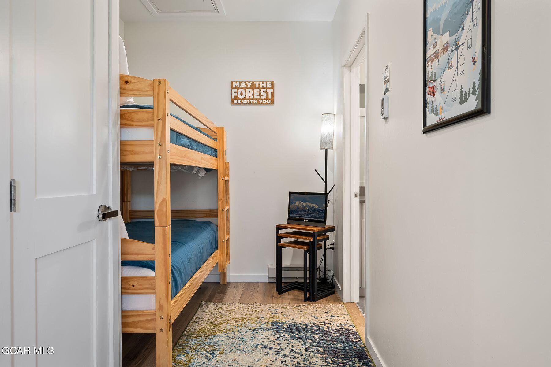 421 West Meadow Mile, Unit 3 Fraser, CO 80442 - Photo 21 of 29 a bedroom with a bed and a closet