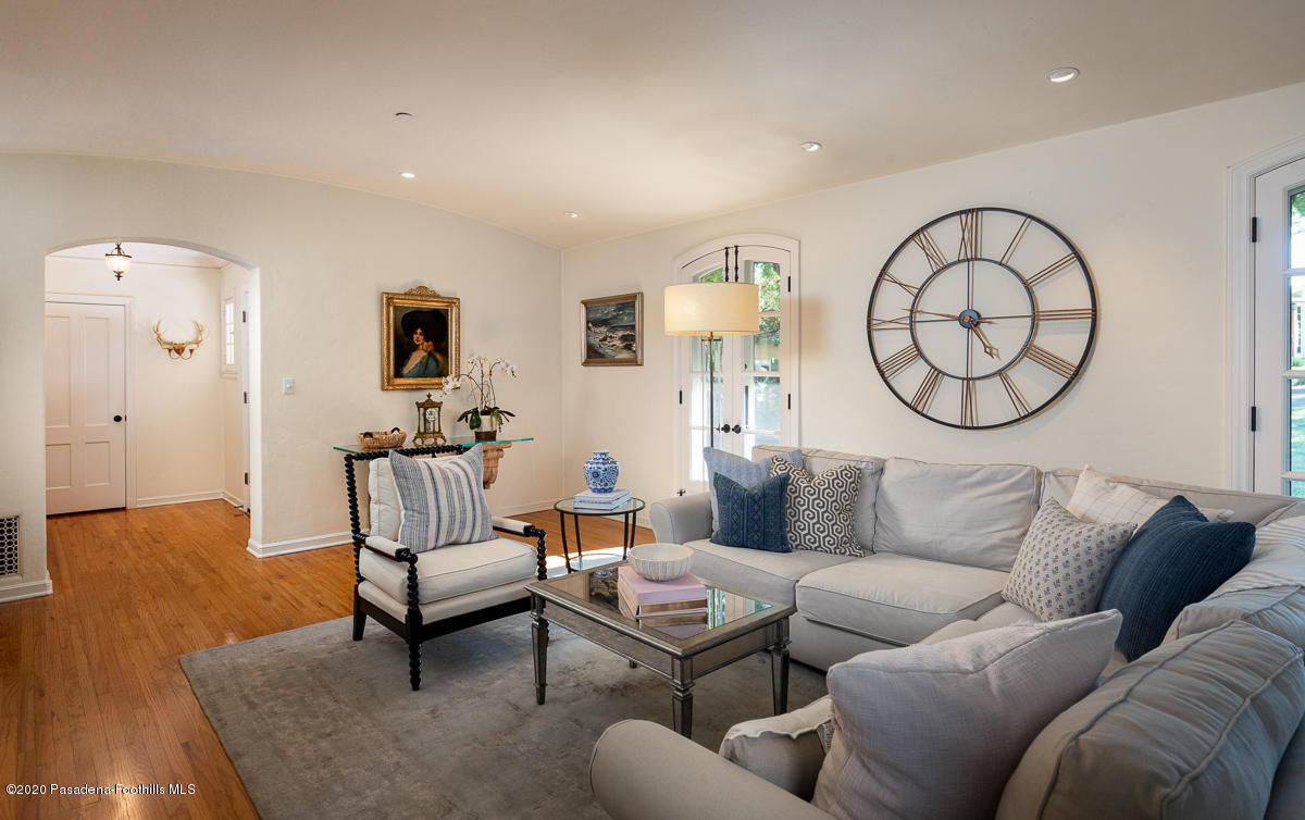 153 Sierra View Road Pasadena, CA 91105 - Photo 12 of 54 a living room with furniture a rug and a large window