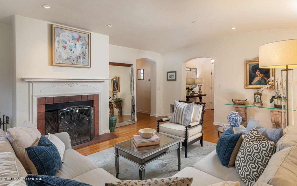 153 Sierra View Road Pasadena, CA 91105 - Photo 13 of 54 a living room with furniture and a fireplace