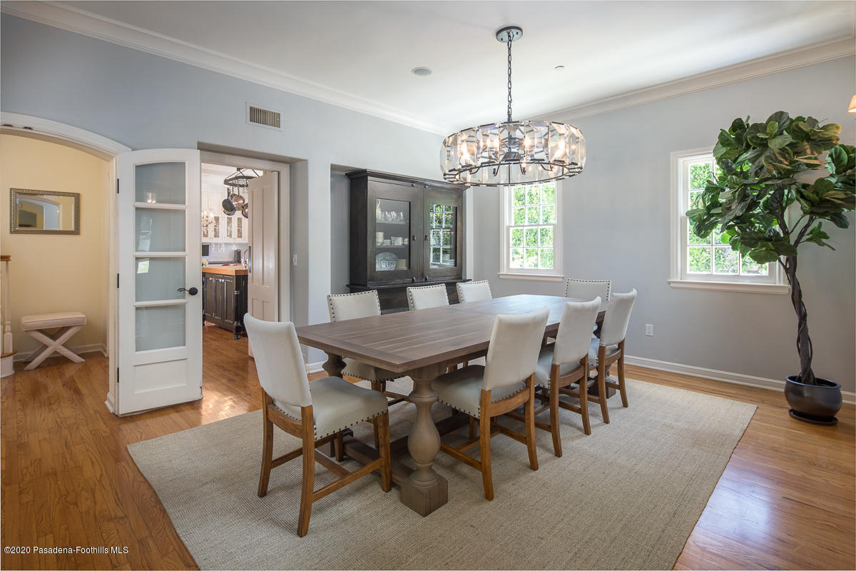 153 Sierra View Road Pasadena, CA 91105 - Photo 15 of 54 a view of a dining room with furniture window and wooden floor