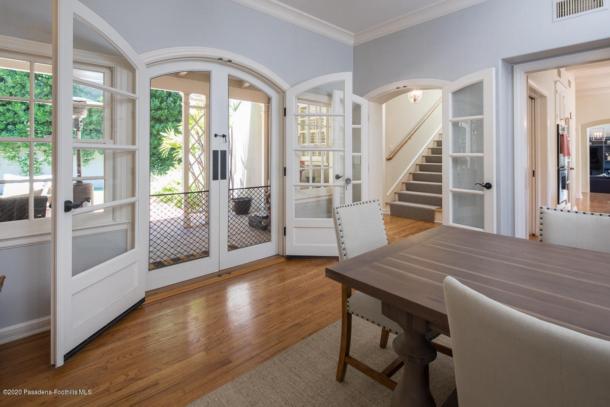 153 Sierra View Road Pasadena, CA 91105 - Photo 16 of 54 a livingroom with furniture wooden floor and windows