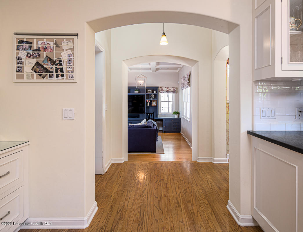 153 Sierra View Road Pasadena, CA 91105 - Photo 22 of 54 a view of a hallway view with wooden floor and workspace