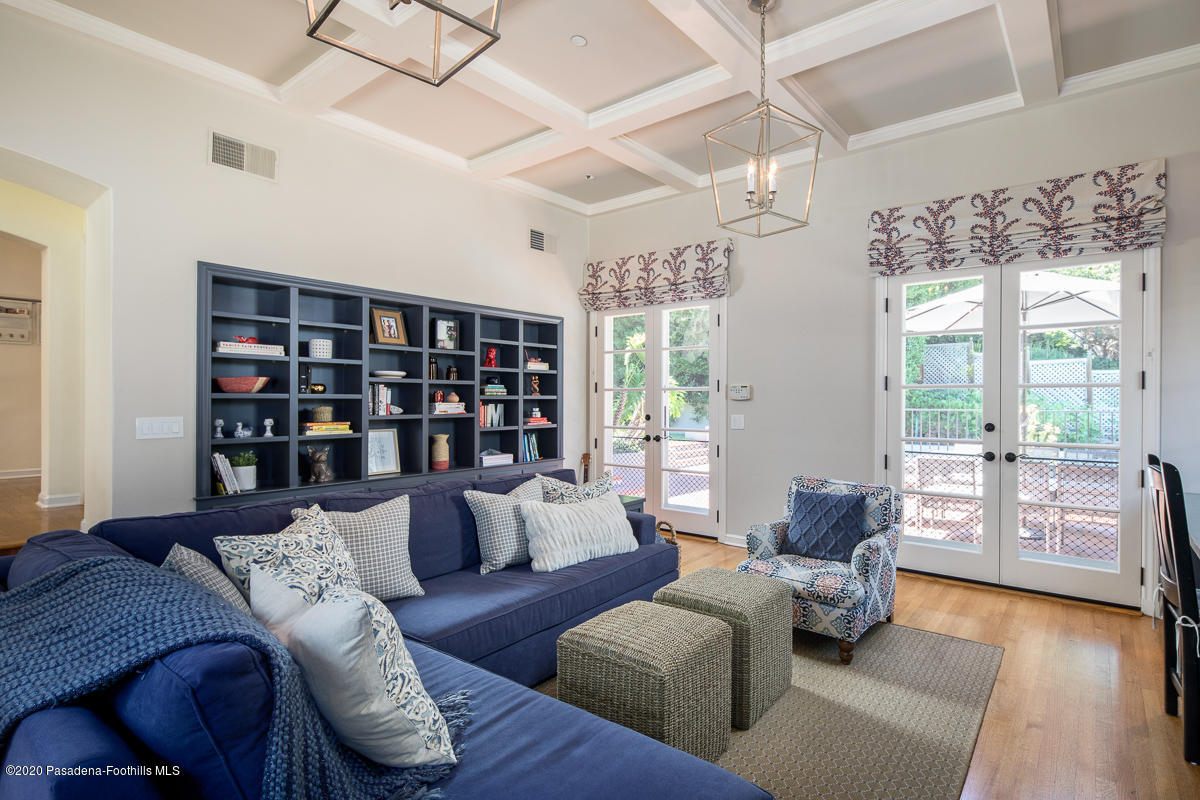 153 Sierra View Road Pasadena, CA 91105 - Photo 24 of 54 a living room with furniture and a book shelf