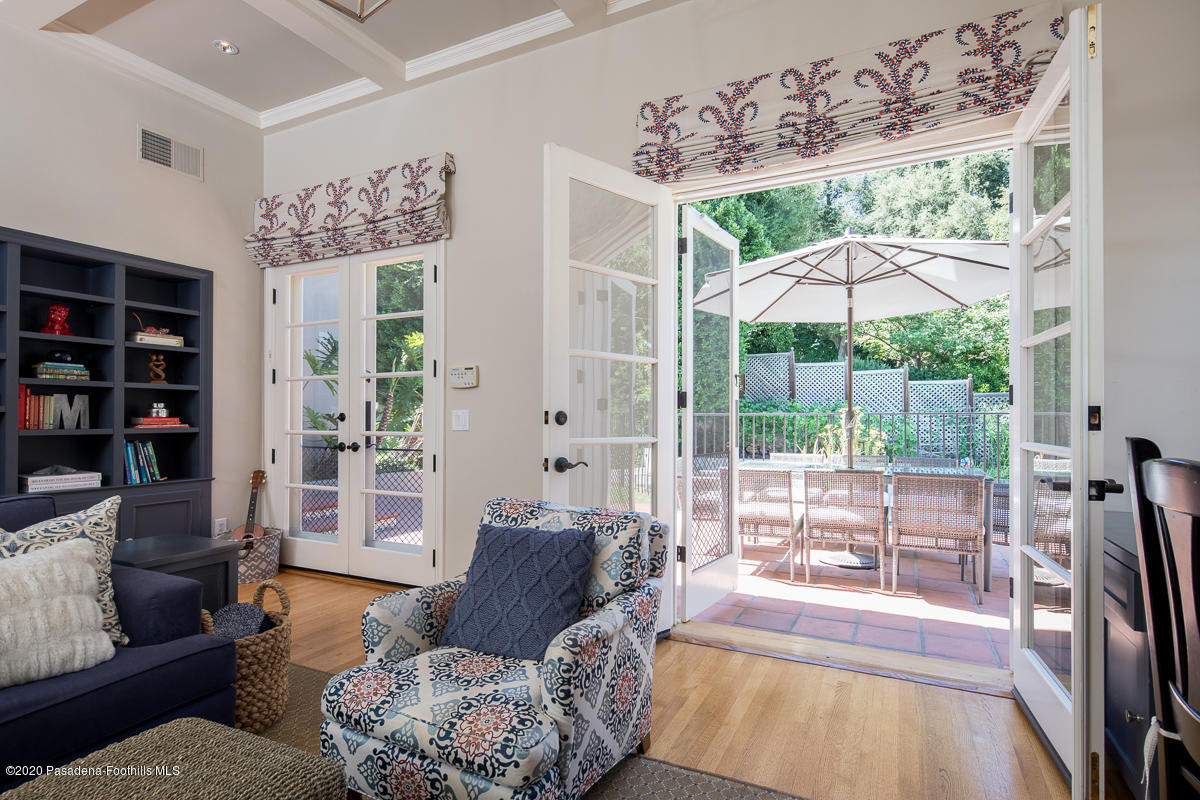 153 Sierra View Road Pasadena, CA 91105 - Photo 25 of 54 a living room with furniture and a large window