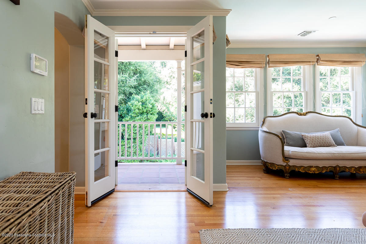 153 Sierra View Road Pasadena, CA 91105 - Photo 32 of 54 a living room with furniture and a large window